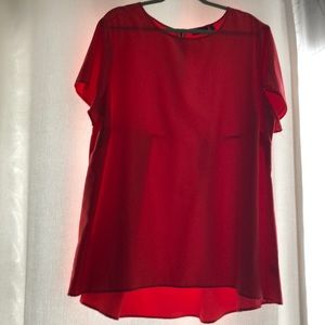 Blouse with pleated and accent zipper backing